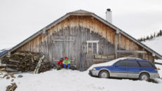 A nice rest next to a winter camped car.