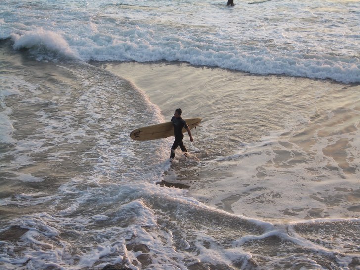 efter ett par underbara vågor så var dagen full�. Foto: peter jonasson. Åkare: william jonasson.