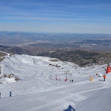 Utsikt ner mot Borreguiles fr&aring;n Pico Veleta. R&ouml;d.