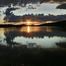 solnedg&aring;ng med tunga moln. Foto: ulf n&auml;rwall.