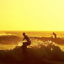 Surfare i motljus, Rebeira D&amp;#039;ilhas.. Foto: Fredrik Ludvigsson. &Aring;kare: Ok&auml;nd.