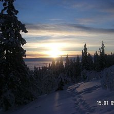 Soluppg&aring;ng med vidh&auml;ngande molnt&auml;cke. Foto: Andreas Clifford. &Aring;kare: &Ouml;k&auml;nt.