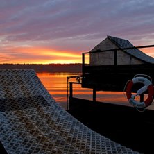en gammal bild fr&aring;n bos&ouml;n under solnedg&aring;ngen so. Foto: hugo ljungquist.